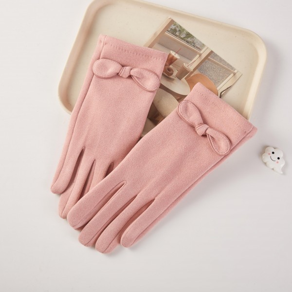 Soft Knit Gloves Featuring Bow Accent 

- One Size Fits 
- 100% Polyester 