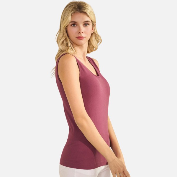 Reversible Seamless Tank With Built-In Bra

- Seamless Construction
- U & V Neckline
- Self Fabric Binding
- 92% Nylon  8% Spandex