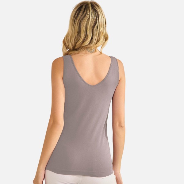 Reversible Seamless Tank With Built-In Bra

- Seamless Construction
- U & V Neckline
- Self Fabric Binding
- 92% Nylon  8% Spandex