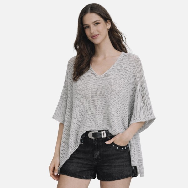 Do Everything In Love Crochet Poncho With Woven Tinsel Detail 

- Approximately 27.6" L X 31.5" W
- 100% Polyester 