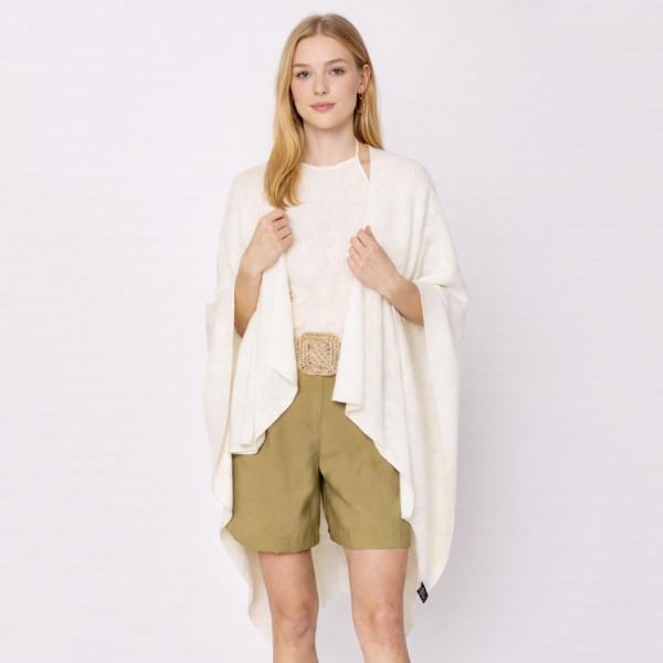 Do Everything In Love Solid Ruana With Shoulder Strap 

- One Size Fits Most 
- 100% Acrylic 
- Approximately 27.95" L X 43.3" W