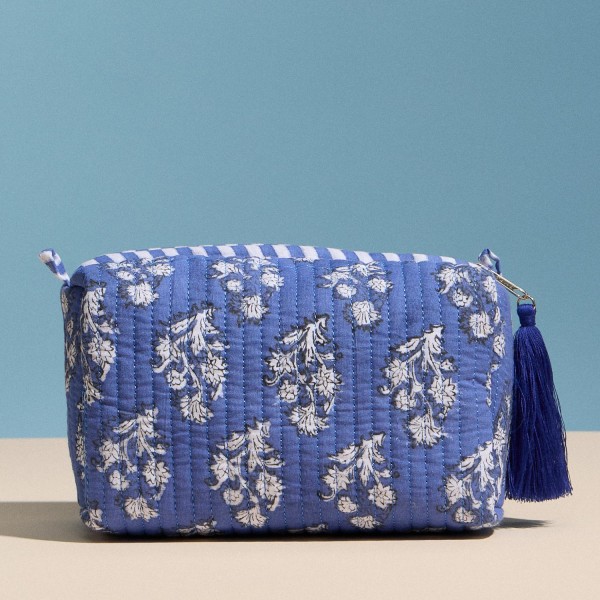Floral Print Quilted Pouch With Tassel

- Full Zip Closure
- Stripe Print Inside
- Approximately  7" L X 5" T X 3.5" D