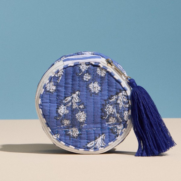 Floral Print Circular Quilt Pouch With Tassel

- Full Zip Closure
- 1 Internal Open Pocket 
- Stripe Print Inside 
- Approximately 4" T X 4" L X 1.75" D