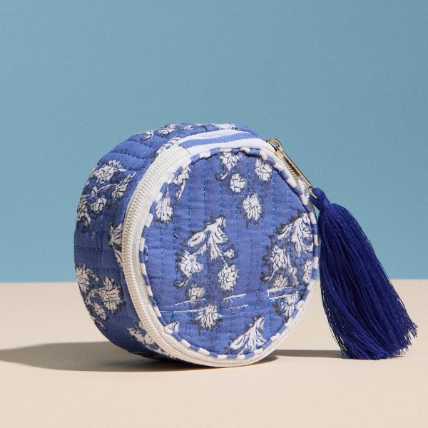 Floral Print Circular Quilt Pouch With Tassel

- Full Zip Closure
- 1 Internal Open Pocket 
- Stripe Print Inside 
- Approximately 4" T X 4" L X 1.75" D