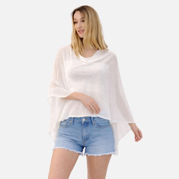 Sheer Knit Cropped Poncho 

- One Size Fits Most 
- 100% Polyester 