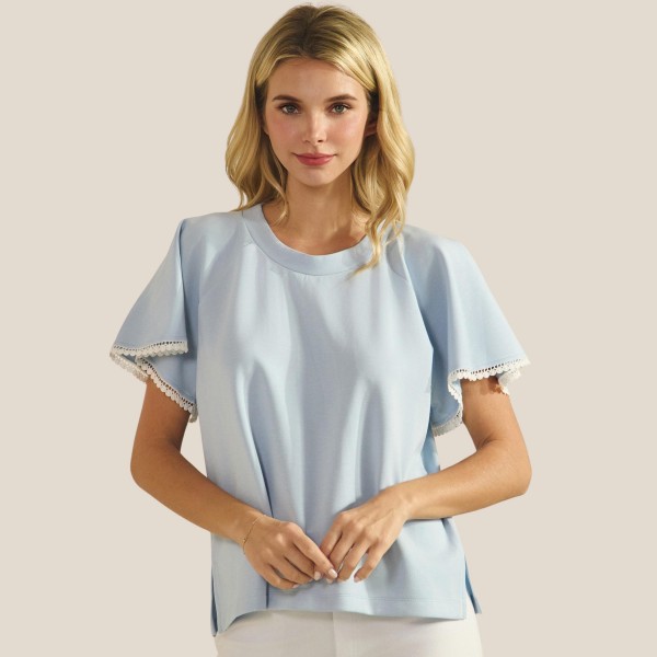 Short Sleeve Scuba Top With Flutter Sleeves (6-Pack)

- Round Neckline
- Draped Silhouette
- Scalloped Edge Trim On Sleeves
- Superior Softness
- Breathable & Stretchy
- 54% Modal 39% Polyester 7% Spandex 