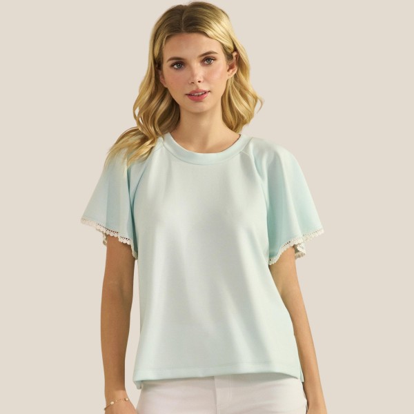 Short Sleeve Scuba Top With Flutter Sleeves (6-Pack)

- Round Neckline
- Draped Silhouette
- Scalloped Edge Trim On Sleeves
- Superior Softness
- Breathable & Stretchy
- 54% Modal 39% Polyester 7% Spandex 