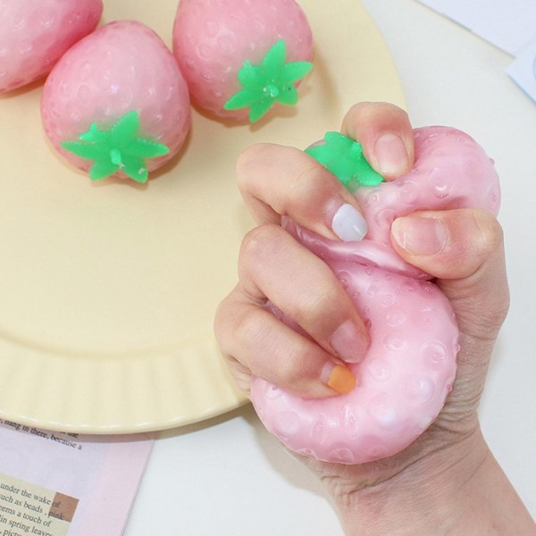Strawberry Squishy Toy

Sweet novelty squishy toy inspired by a strawberry design.

- Ages 3+
- Approximately 3.5" L