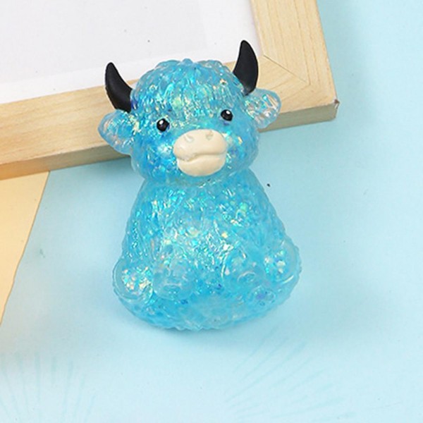 Blue Glitter Cow Squishy Toy

Adorable novelty squishy toy featuring a cow design.

- Ages 3+
- Approximately 3" L