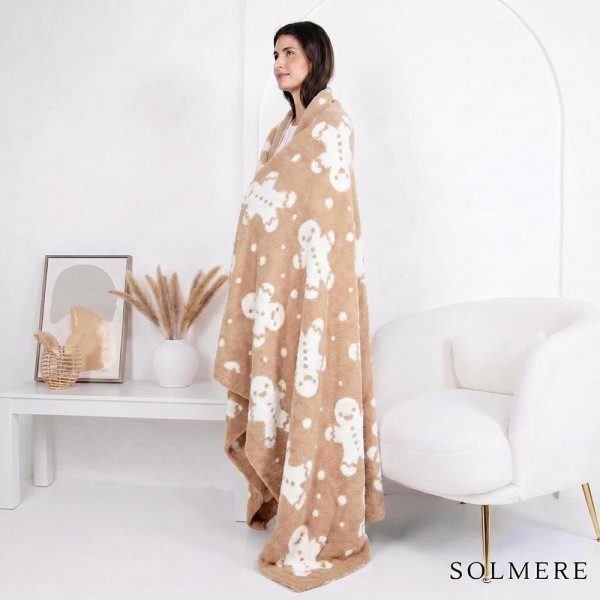 Solmere Blanket – Gingerbread Man Blanket

Wrap yourself in pure indulgence. Our Solmere Blanket combines a fashion-forward design with an irresistibly soft hand-feel that’s as beautiful as it is cozy.

- Luxuriously Soft – Crafted from ultra-plush, high-quality fibers you’ll want to snuggle into all season long.

- Perfectly Sized – Approximately 50” W x 60” L, perfect for draping over your sofa, bed, or yourself.

- Premium Craftsmanship – 100% polyester for lasting softness, warmth, and easy care.

- Thoughtful Packaging – Each blanket is tied with a branded ribbon in a bow and includes two cards: one featuring the SOLMERE brand and another showcasing a high-quality image of the blanket’s print. Individually packaged

Once you touch it, you’ll understand why SOLMERE blankets are love at first feel.
