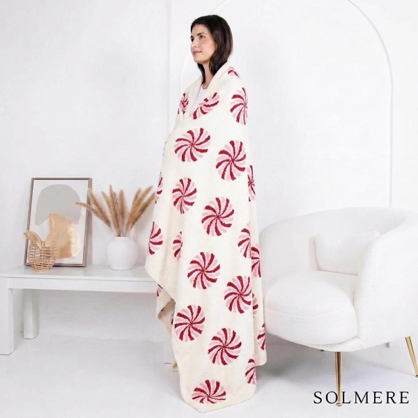 Solmere Blanket – Christmas Candy Blanket

Wrap yourself in pure indulgence. Our Solmere Blanket combines a fashion-forward design with an irresistibly soft hand-feel that’s as beautiful as it is cozy.

- Luxuriously Soft – Crafted from ultra-plush, high-quality fibers you’ll want to snuggle into all season long.

- Perfectly Sized – Approximately 50” W x 60” L, perfect for draping over your sofa, bed, or yourself.

- Premium Craftsmanship – 100% polyester for lasting softness, warmth, and easy care.

- Thoughtful Packaging – Each blanket is tied with a branded ribbon in a bow and includes two cards: one featuring the SOLMERE brand and another showcasing a high-quality image of the blanket’s print. Individually packaged

Once you touch it, you’ll understand why SOLMERE blankets are love at first feel.
