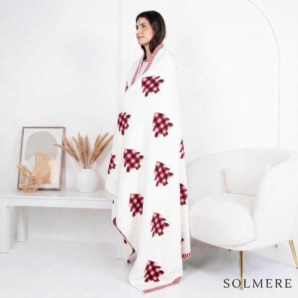 Solmere Blanket – Plaid Christmas Tree Blanket

Wrap yourself in pure indulgence. Our Solmere Blanket combines a fashion-forward design with an irresistibly soft hand-feel that’s as beautiful as it is cozy.

- Luxuriously Soft – Crafted from ultra-plush, high-quality fibers you’ll want to snuggle into all season long.

- Perfectly Sized – Approximately 50” W x 60” L, perfect for draping over your sofa, bed, or yourself.

- Premium Craftsmanship – 100% polyester for lasting softness, warmth, and easy care.

- Thoughtful Packaging – Each blanket is tied with a branded ribbon in a bow and includes two cards: one featuring the SOLMERE brand and another showcasing a high-quality image of the blanket’s print. Individually packaged

Once you touch it, you’ll understand why SOLMERE blankets are love at first feel.