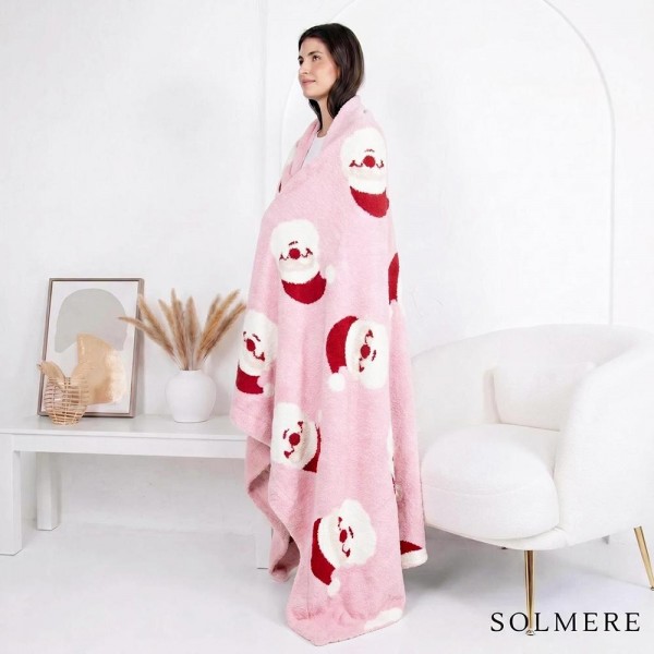 Solmere Blanket – Santa Blanket

Wrap yourself in pure indulgence. Our Solmere Blanket combines a fashion-forward design with an irresistibly soft hand-feel that’s as beautiful as it is cozy.

- Luxuriously Soft – Crafted from ultra-plush, high-quality fibers you’ll want to snuggle into all season long.

- Perfectly Sized – Approximately 50” W x 60” L, perfect for draping over your sofa, bed, or yourself.

- Premium Craftsmanship – 100% polyester for lasting softness, warmth, and easy care.

- Thoughtful Packaging – Each blanket is tied with a branded ribbon in a bow and includes two cards: one featuring the SOLMERE brand and another showcasing a high-quality image of the blanket’s print. Individually packaged

Once you touch it, you’ll understand why SOLMERE blankets are love at first feel.
