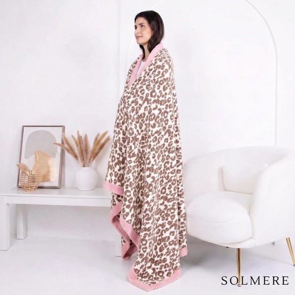 Solmere Blanket – Pink Bordered Leopard Print Blanket

Wrap yourself in pure indulgence. Our Solmere Blanket combines a fashion-forward design with an irresistibly soft hand-feel that’s as beautiful as it is cozy.

- Luxuriously Soft – Crafted from ultra-plush, high-quality fibers you’ll want to snuggle into all season long.

- Perfectly Sized – Approximately 50” W x 60” L, perfect for draping over your sofa, bed, or yourself.

- Premium Craftsmanship – 100% polyester for lasting softness, warmth, and easy care.

- Thoughtful Packaging – Each blanket is tied with a branded ribbon in a bow and includes two cards: one featuring the SOLMERE brand and another showcasing a high-quality image of the blanket’s print. Individually packaged

Once you touch it, you’ll understand why SOLMERE blankets are love at first feel.