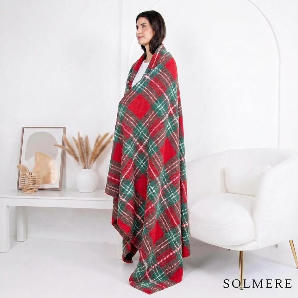 Solmere Blanket – Plaid Christmas Blanket

Wrap yourself in pure indulgence. Our Solmere Blanket combines a fashion-forward design with an irresistibly soft hand-feel that’s as beautiful as it is cozy.

- Luxuriously Soft – Crafted from ultra-plush, high-quality fibers you’ll want to snuggle into all season long.

- Perfectly Sized – Approximately 50” W x 60” L, perfect for draping over your sofa, bed, or yourself.

- Premium Craftsmanship – 100% polyester for lasting softness, warmth, and easy care.

- Thoughtful Packaging – Each blanket is tied with a branded ribbon in a bow and includes two cards: one featuring the SOLMERE brand and another showcasing a high-quality image of the blanket’s print. Individually packaged

Once you touch it, you’ll understand why SOLMERE blankets are love at first feel.