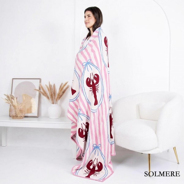Solmere Blanket – Stripe & Lobster Blanket

Wrap yourself in pure indulgence. Our Solmere Blanket combines a fashion-forward design with an irresistibly soft hand-feel that’s as beautiful as it is cozy.

- Luxuriously Soft – Crafted from ultra-plush, high-quality fibers you’ll want to snuggle into all season long.

- Perfectly Sized – Approximately 50” W x 60” L, perfect for draping over your sofa, bed, or yourself.

- Premium Craftsmanship – 100% polyester for lasting softness, warmth, and easy care.

- Thoughtful Packaging – Each blanket is tied with a branded ribbon in a bow and includes two cards: one featuring the SOLMERE brand and another showcasing a high-quality image of the blanket’s print. Individually packaged

Once you touch it, you’ll understand why SOLMERE blankets are love at first feel.

View more SOLMERE Blankets, Fall / Winter 2025, Blankets and Pillows