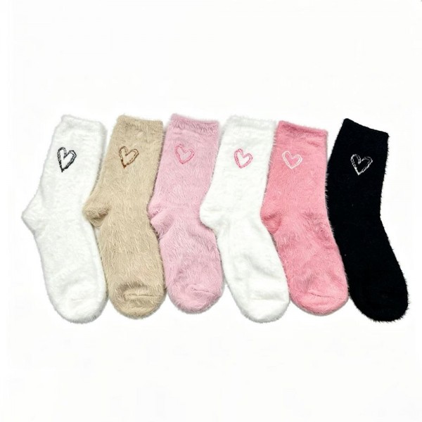 Stock the sweetest gift-ready hosiery on your wall with this assorted six-pack of plush feather-knit crew socks featuring a tiny embroidered heart at the cuff. Spun from a brushed, fuzzy yarn blend that feels irresistibly soft against the skin, each pair adds an instant smile factor with its little hand-drawn heart detail — the kind of design that drives Instagram tags and repeat boutique orders. The mid-calf length and stretch ribbed top layer beautifully with leggings, joggers, and lounge sets. A natural anchor for Valentine displays, bridal party gifts, hostess bundles, and self-care assortments that need a touch of charm.