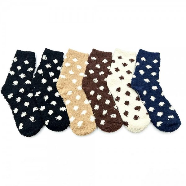 Round out your cozy basics with this assorted six-pack of plush polka dot crew socks designed to feel like a hug for the feet. Knit from a brushed, fuzzy yarn blend with a high-softness loft, each pair carries a timeless dot pattern that reads sweet, simple, and easy to merchandise across boutique aesthetics. The mid-calf length and stretch ribbed cuff layer naturally under jeans, leggings, and lounge pants. A no-brainer add-on for gift sets, bridesmaid favors, hostess bundles, and self-care displays — the kind of impulse buy that walks out the door right next to a candle or coffee mug.
