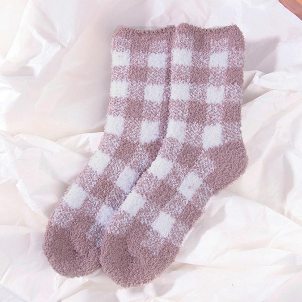 Bring rustic charm and shelf-ready variety to your hosiery section with this assorted six-pack of plush buffalo check crew socks. Each pair features a classic two-tone gingham check woven into a brushed, fuzzy yarn blend that feels irresistibly soft — built for chilly mornings, fireplace evenings, and lazy Sunday loungewear. The mid-calf length and stretch ribbed cuff pair effortlessly with leggings, joggers, and rolled denim. A cabin-core staple that flies off the shelf during cooler seasons and makes a thoughtful add-on for hostess gifts, holiday stocking sets, and farmhouse-style boutique displays.