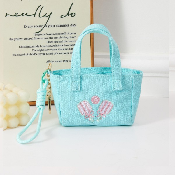 Key Ring Pickleball Embroidered Mini Tote bag With Knotted Rope Detail

- 1 Open External Pocket 
- Handel Drop 4" L 
- Metal Key Ring 
- 100% Cotton 
- Approximately 5.5" L X 4" T X 2" D