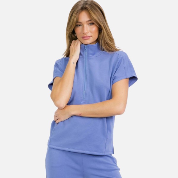 Half Zip Short Sleeve Top (6-Pack)

- Classic Fit
- Short Dolma Sleeves 
- Unlined
- 40% Modal 53.4% Polyester 6.6% Spandex 
- Matching Shorts- Item # 7325168
