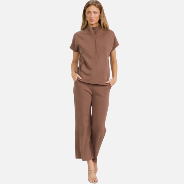 Half Zip Short Sleeve Top (6-Pack)

- Classic Fit
- Short Dolma Sleeves 
- Unlined
- 40% Modal 53.4% Polyester 6.6% Spandex 
- Matching Shorts- Item # 7325168