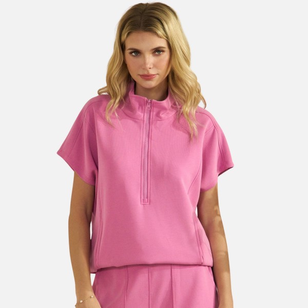 Half Zip Short Sleeve Top (6-Pack)

- Classic Fit
- Short Dolma Sleeves 
- Unlined
- 40% Modal 53.4% Polyester 6.6% Spandex 
- Matching Shorts- Item # 7325168