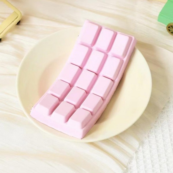 This chocolate bar squishy toy is a sweet novelty gift that sells itself. Shaped like a classic segmented confection bar with realistic molded detail, it is made from slow-rise memory foam for a satisfying squeeze and a tactile stress-relief experience kids and adults both love. A strong performer in gift shops, candy boutiques, and novelty retailers — it ships flat, stores easily, and has broad customer appeal as a fun, affordable impulse pick or small gift under ten dollars.