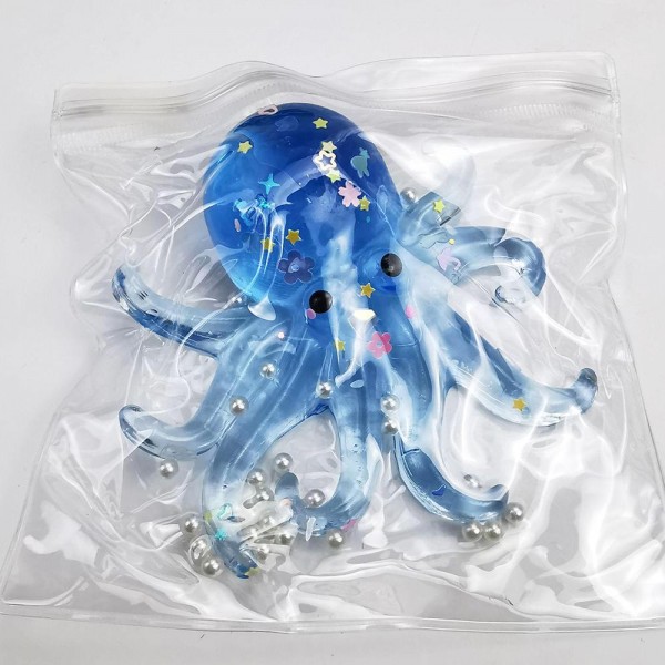 This translucent jelly octopus is a wiggly, tactile novelty toy that customers of all ages love. Made from a soft, stretchy gel material with a squishy, flexible body and dangling tentacles, it delivers a uniquely satisfying sensory experience. The see-through finish gives it a fun, eye-catching look on display. Perfect for novelty boutiques, toy retailers, and gift shops — it drives impulse purchases and excites customers on contact. A must-have for any squishy and novelty toy assortment.