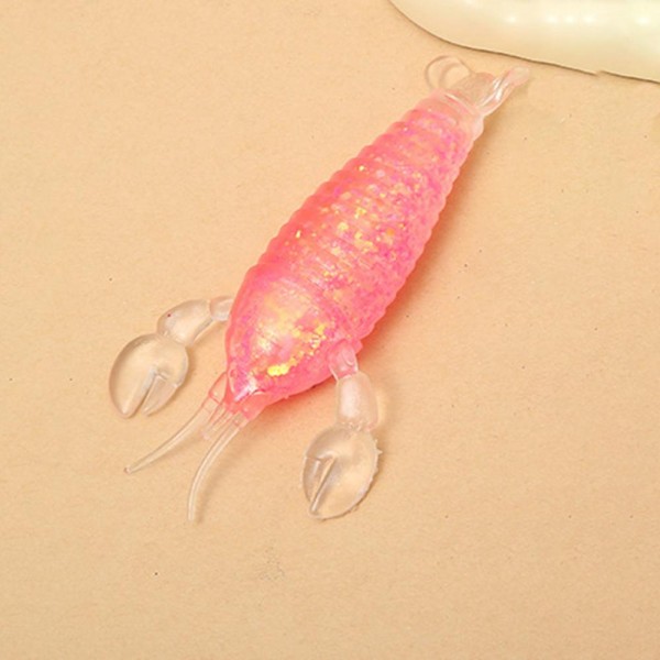 This shrimp-shaped squishy toy is a quirky, conversation-starting novelty that sells on personality alone. Molded in a lifelike curved shape with detailed surface texture, it is crafted from slow-rise memory foam with a satisfying squeeze. Fun, lightweight, and compact, it makes a great impulse gift, stocking stuffer, or desk novelty. A strong performer in gift boutiques and novelty toy displays, its unexpectedly fun design generates instant customer reactions — exactly the kind of product that builds add-on sales.