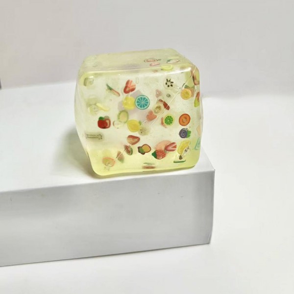 This translucent floral cube squishy toy is a decorative novelty with irresistible shelf appeal. Its soft, clear squeeze body reveals a floating floral confetti design inside, making it as pretty as it is fun to squish. Made from soft, flexible material with a satisfying tactile feel, it appeals to gift buyers, decor enthusiasts, and novelty toy shoppers alike. A standout impulse buy for gift boutiques and novelty retailers — it photographs beautifully and generates strong customer interest.