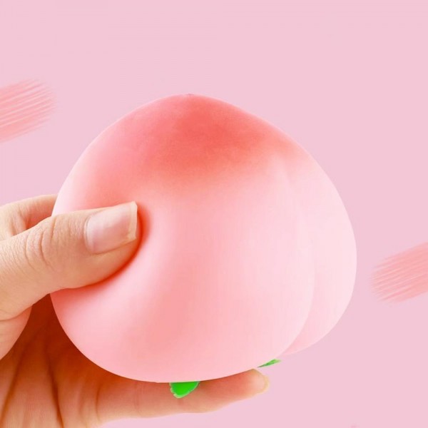 This peach squishy toy is a sweet, fruit-inspired novelty that customers love to squeeze. Shaped like a plump, round stone fruit with a realistic molded crease and tiny stem detail, it is crafted from slow-rise memory foam with a smooth, skin-soft finish. Lightweight and palm-sized, it makes an adorable stress reliever, impulse gift, or stocking stuffer. A natural fit for gift boutiques, summer novelty assortments, and food-themed gift sections — displays well in any format and sells consistently.