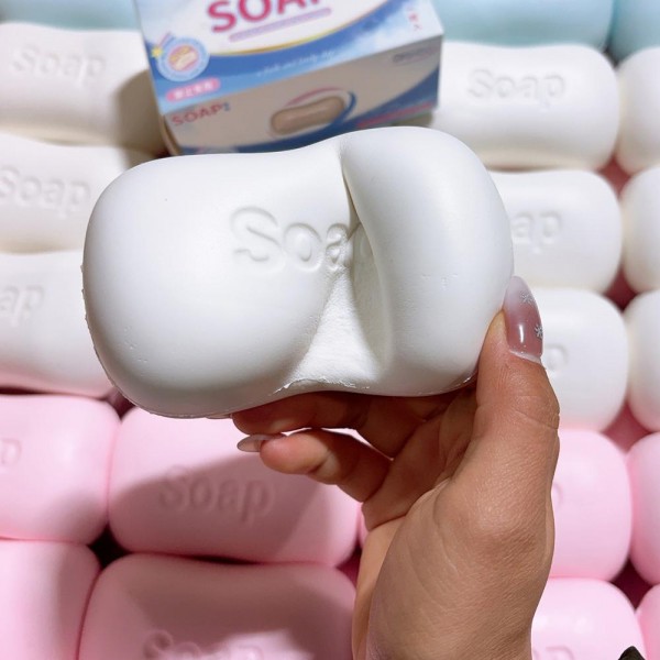 This soap bar squishy toy is a clever novelty that surprises and delights at first squeeze. Shaped to look exactly like a real bar of soap, complete with embossed lettering, it is crafted from slow-rise memory foam that feels soft and realistic. Fun as a bathroom gag gift, desk toy, or impulse buy, it appeals to a wide range of customers. A great fit for gift boutiques, novelty shops, and lifestyle retailers — compact, lightweight, and impossible to put down.