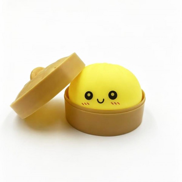 Light Up Dumpling Squishy Toy

Cute novelty squishy toy designed as a smiling dumpling in a bamboo-style steamer. Perfect for gifts, impulse buys, and food-themed novelty displays.

- LED 
- Ages 3+
- Approximately 3" L
