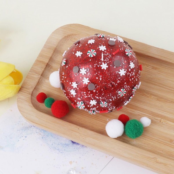 Christmas Glitter Ball Squishy Toy

Cute novelty squishy toy designed as a Christmas glitter ball. Perfect for gifts, impulse buys, and holiday-themed novelty displays.

- Ages 3+
- Approximately 3" L