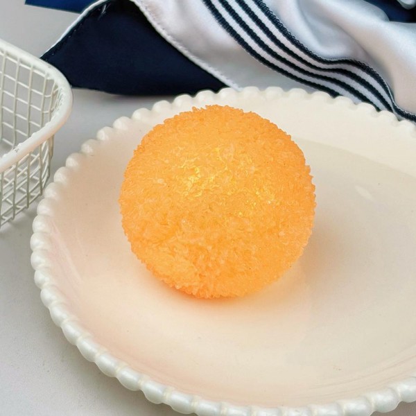 Textured Ball Squishy Toy

Cute novelty squishy toy designed as a textured ball. Perfect for gifts, impulse buys, and food-themed novelty displays.

- Ages 3+
- Approximately 3" L