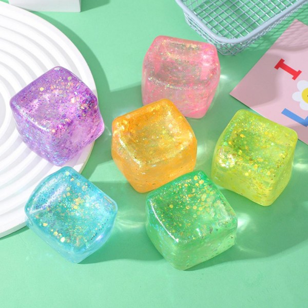 Glitter Cube Squishy Toy

Cute novelty squishy toy designed as a glitter cube. Perfect for gifts, impulse buys, and themed novelty displays.

- Ages 3+
- Approximately 3" L