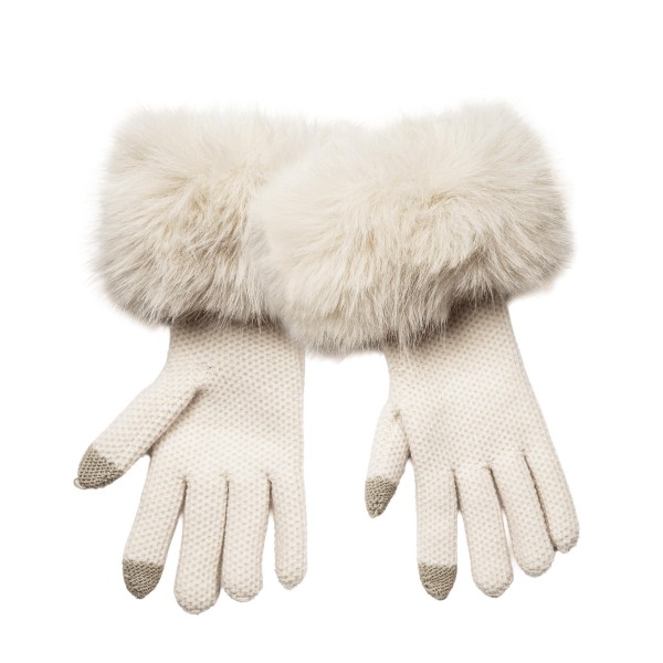 Faux Fur Cuff Knit Gloves with a lush, oversized pile cuff that frames the wrist and a soft, fine knit hand for everyday comfort. Touchscreen fingertips make it easy to answer calls and check maps without exposing cold hands. A polished pick for holiday parties, winter travel, and weekend errands. Faux fur trimmed gloves feel luxe at an accessible price, so they sell as gifts and self treats right through the season.