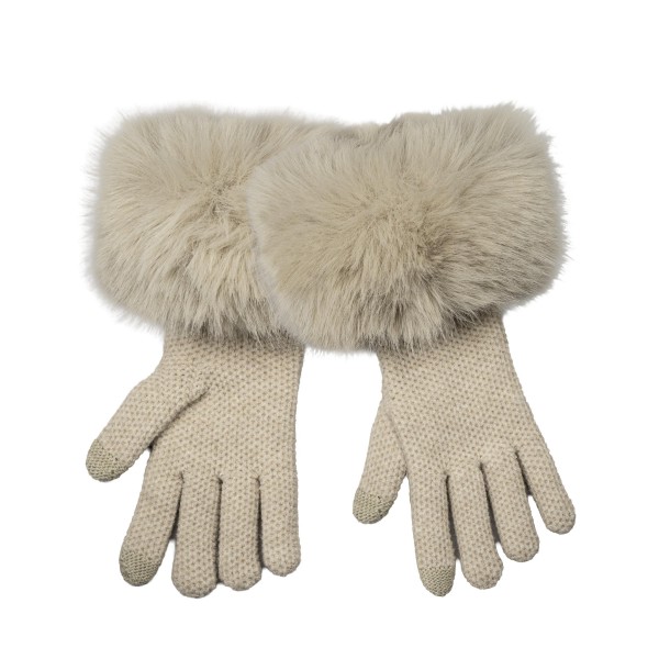 Faux Fur Cuff Knit Gloves with a lush, oversized pile cuff that frames the wrist and a soft, fine knit hand for everyday comfort. Touchscreen fingertips make it easy to answer calls and check maps without exposing cold hands. A polished pick for holiday parties, winter travel, and weekend errands. Faux fur trimmed gloves feel luxe at an accessible price, so they sell as gifts and self treats right through the season.