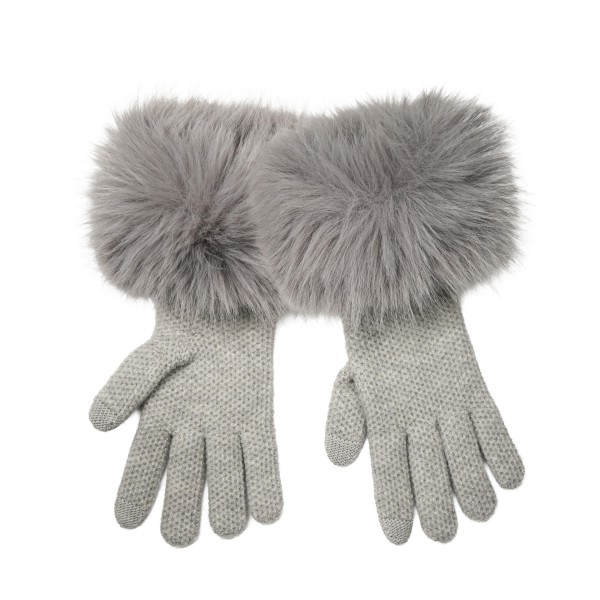 Faux Fur Cuff Knit Gloves with a lush, oversized pile cuff that frames the wrist and a soft, fine knit hand for everyday comfort. Touchscreen fingertips make it easy to answer calls and check maps without exposing cold hands. A polished pick for holiday parties, winter travel, and weekend errands. Faux fur trimmed gloves feel luxe at an accessible price, so they sell as gifts and self treats right through the season.