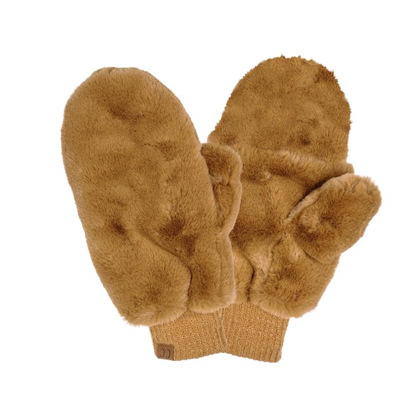 Plush faux fur mittens with a dense soft pile outside and a knit cuff that seals warmth in at the wrist. The lined interior keeps hands warm on a walk to the car or a morning at a market without the bulk of a ski glove. Light enough to stuff in a coat pocket and soft enough that customers keep touching them on the display. Faux fur mittens are a strong gift item and an easy pairing with beanies and scarves.