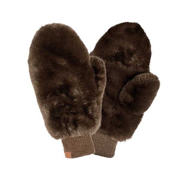 Plush faux fur mittens with a dense soft pile outside and a knit cuff that seals warmth in at the wrist. The lined interior keeps hands warm on a walk to the car or a morning at a market without the bulk of a ski glove. Light enough to stuff in a coat pocket and soft enough that customers keep touching them on the display. Faux fur mittens are a strong gift item and an easy pairing with beanies and scarves.