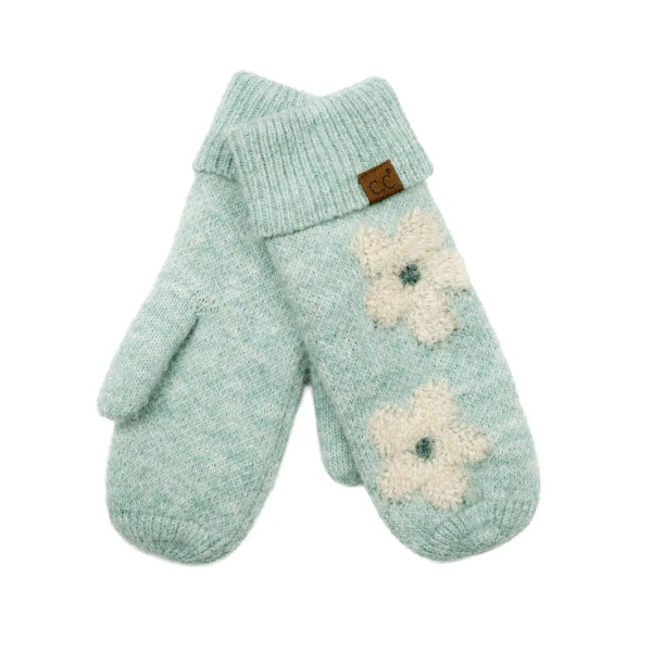 Heathered knit mittens with raised daisy appliques across the back of the hand and a ribbed fold over cuff. The soft, textured knit traps warmth and feels cozy on frosty walks, holiday markets, and school runs. Playful flower details bring a cheerful, retro feel to a practical cold weather basic. A fun gift pick that pairs perfectly with beanies and scarves and sells well in multiples.