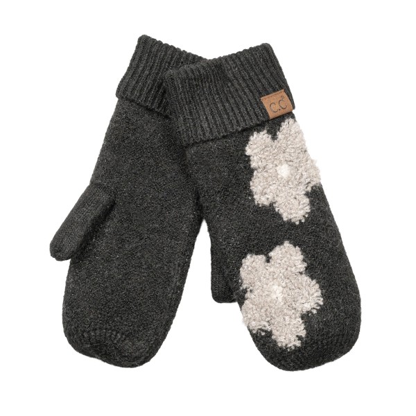 Heathered knit mittens with raised daisy appliques across the back of the hand and a ribbed fold over cuff. The soft, textured knit traps warmth and feels cozy on frosty walks, holiday markets, and school runs. Playful flower details bring a cheerful, retro feel to a practical cold weather basic. A fun gift pick that pairs perfectly with beanies and scarves and sells well in multiples.