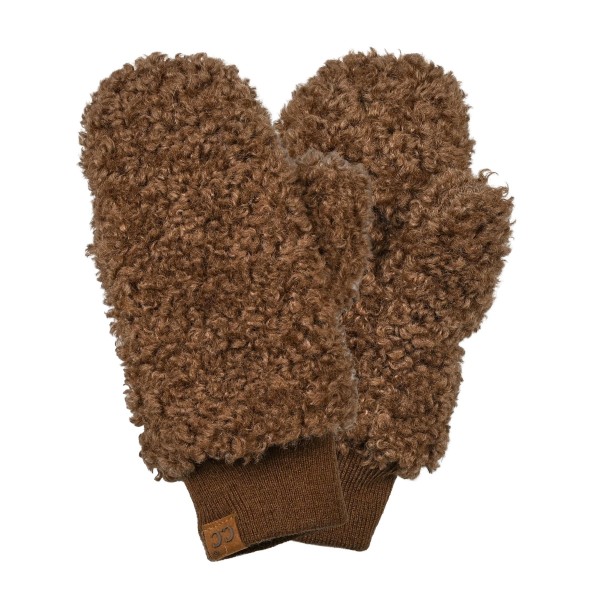 Curly Teddy Sherpa Mittens made from plush, curly faux shearling with a snug ribbed knit cuff that seals out cold air. The roomy mitten shape traps warmth on the coldest days, while the soft, nubby texture feels cozy against the hands. Perfect for holiday markets, school pickup, sledding days, and winter travel. A giftable cold weather essential that pairs easily with beanies and scarves for quick add on sales.