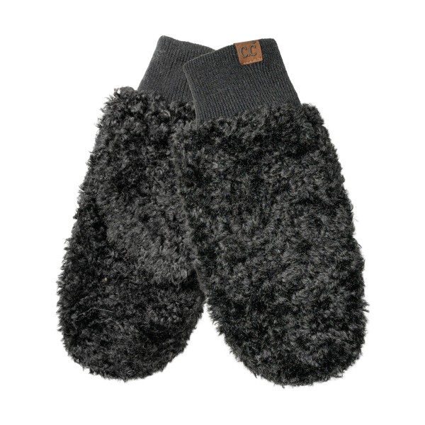 Curly Teddy Sherpa Mittens made from plush, curly faux shearling with a snug ribbed knit cuff that seals out cold air. The roomy mitten shape traps warmth on the coldest days, while the soft, nubby texture feels cozy against the hands. Perfect for holiday markets, school pickup, sledding days, and winter travel. A giftable cold weather essential that pairs easily with beanies and scarves for quick add on sales.
