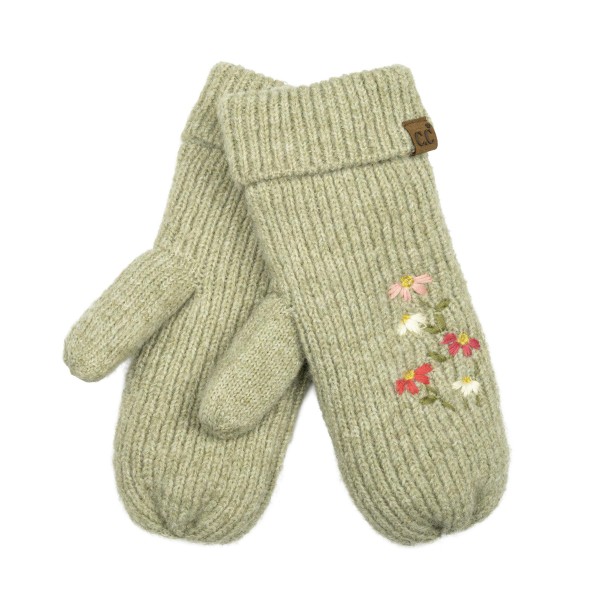 Knit mittens with a delicate embroidered wildflower sprig on the back of the hand and a ribbed fold over cuff. The soft, warm knit keeps hands cozy on chilly walks, holiday shopping trips, and school pickup lines. A dainty floral detail gives a classic winter staple a fresh, feminine touch. An easy gift item that pairs beautifully with beanies and scarves in a cold weather display.