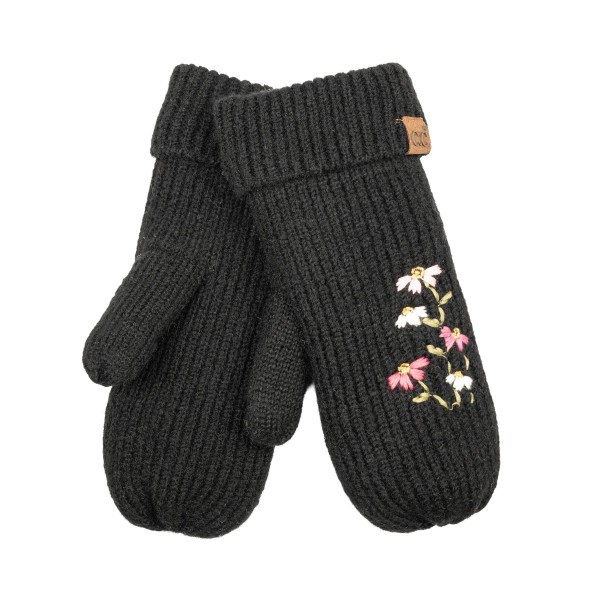 Knit mittens with a delicate embroidered wildflower sprig on the back of the hand and a ribbed fold over cuff. The soft, warm knit keeps hands cozy on chilly walks, holiday shopping trips, and school pickup lines. A dainty floral detail gives a classic winter staple a fresh, feminine touch. An easy gift item that pairs beautifully with beanies and scarves in a cold weather display.
