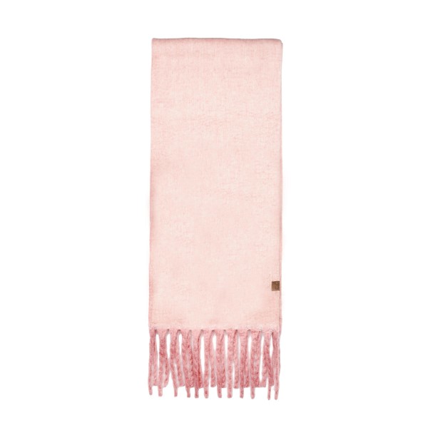 Brushed heavyweight scarf with a soft napped face and fringed ends, cut long enough to wrap twice and still hang past the chest. The dense weave holds warmth on a cold morning without the itch of a coarse wool. A solid finish layers over every coat and every print already on the floor, which makes it an easy pairing sale. Fringed winter scarves are a proven cold weather driver and they gift well with no extra packaging.