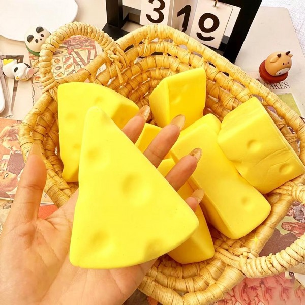 Cheese Wedge Squishy Toy

Novelty squishy toy styled like a classic cheese wedge.

- Ages 3+
- Approximately 4" L
